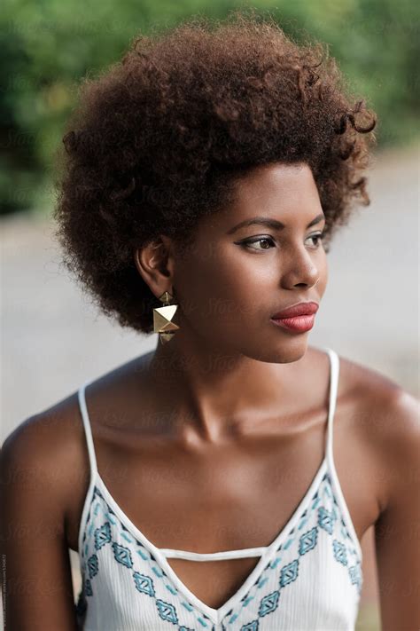 Portrait Of Elegant African Woman With Afro Hairstyle By Stocksy
