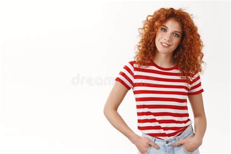 confident assertive gorgeous curly haired redhead woman hold hands