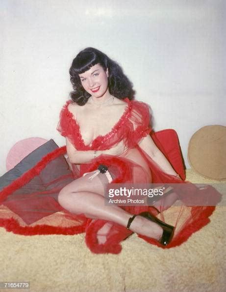 american glamour model and pin up girl bettie page poses in a red news photo getty images