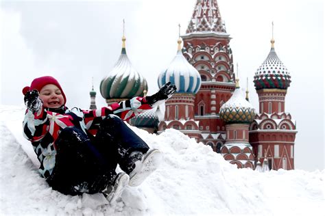 holiday season fun   air russian kids play snow  moscow cgtn