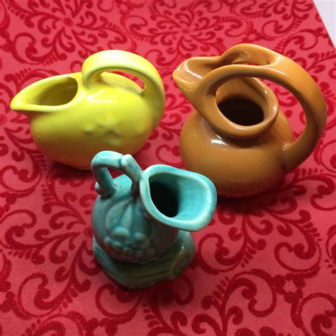 mid century mod mini pitchers jugs shawnee usa pottery
