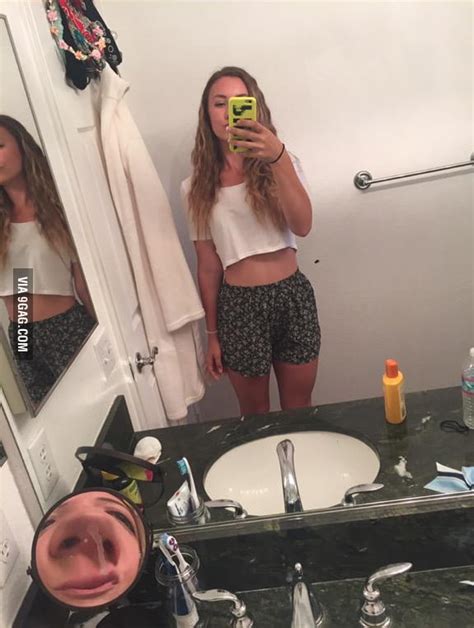 She Tried To Take A Mirror Selfie Look Closely 9gag