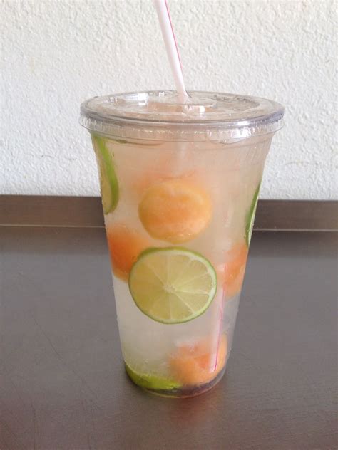 delicious spa fruit water  sweet cantaloupe lime slices www