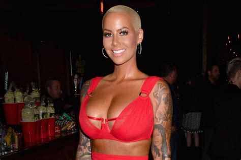 amber rose on her decision to get breast reduction surgery teen vogue
