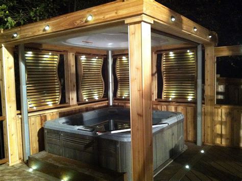 enclosed hot tub area complete  lighting privacy screens