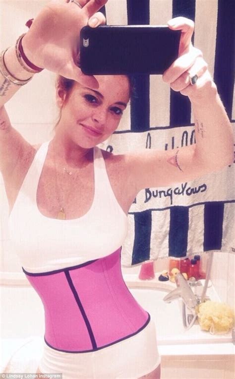 Lindsay Lohan Shows Off Her Taut Tummy In Waist Training Selfie Daily