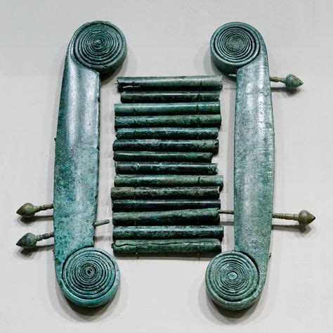 bronze musical instrument forerunner    century bc sistrum