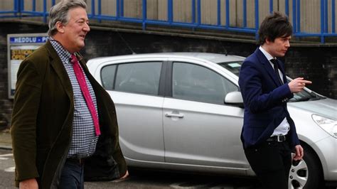 stephen fry s partner elliott spencer banned from driving bbc news