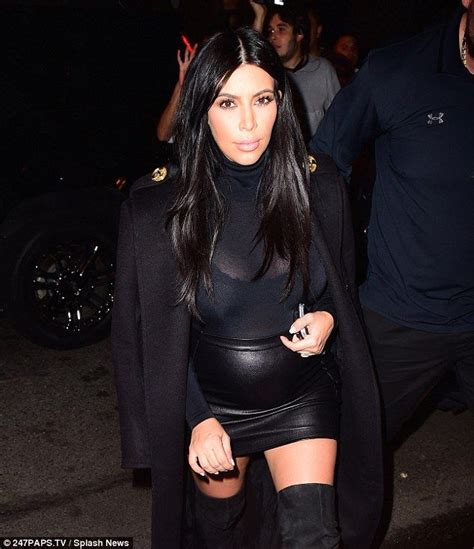 kim kardashian squeezes into mini skirt for dinner with