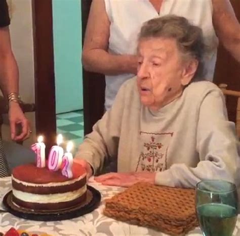 102 year old louise bonito blows out birthday candles but loses her