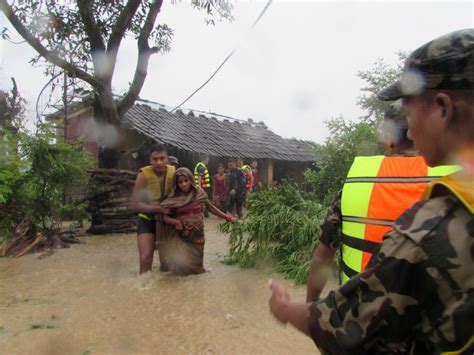 Flash Floods Kill Scores In Nepal India