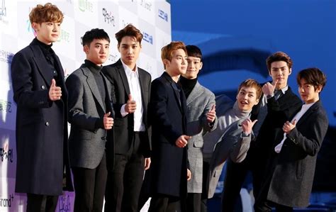 exo completes seoul  award  peat  korea times