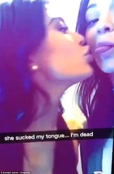 kendall jenner slips her tongue into kylie s mouth in