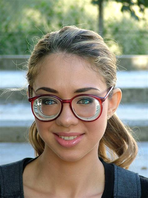 Blandi Cute Girl With Big Round Strong Glasses A Photo