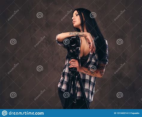 Seductive Tattooed Girl Wearing An Unbuttoned Checked Shirt Girl Posing