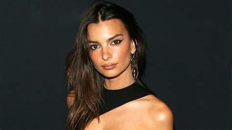 emily ratajkowski poses nearly nude while hanging out with