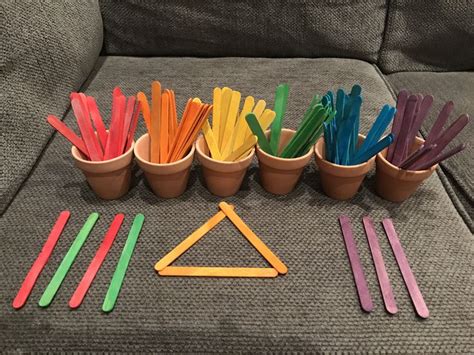 dollar tree win rainbow craft sticks  tiny pots