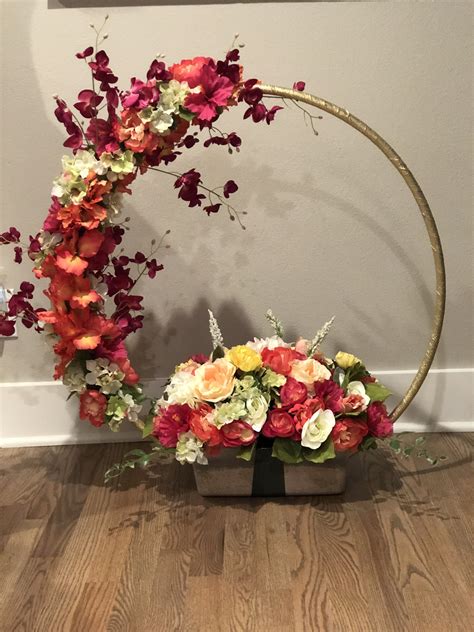 Hula hoop center piece | Floral hoops, Flower backdrop