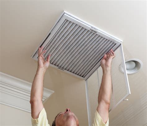 clean  air conditioner filter   easy steps bob vila