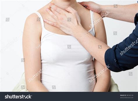 massage therapist giving a massage female receiving