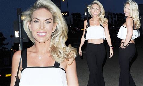 towie s frankie essex shows off her toned waist in frilly crop top in essex