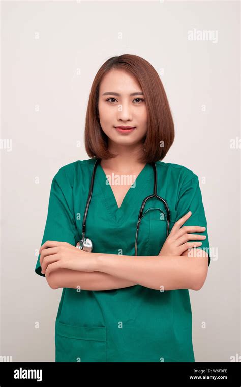 Portrait Of An Attractive Young Female Nurse With Stethoscope Stock