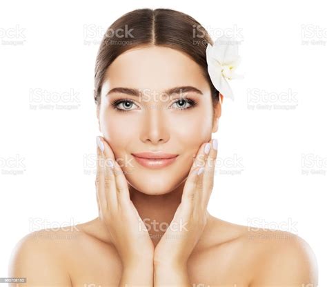 face beauty skin care woman natural make up model touch cheeks by hand
