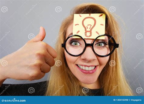 woman  light bulb mark  forehead thinking stock photo image  idea bulb