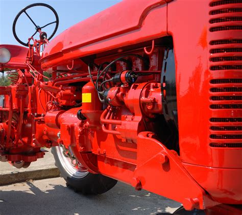 classic red tractor engine  stock photo public domain pictures