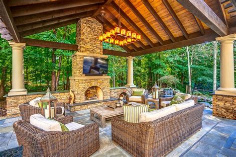 Stone Patio With Outdoor Kitchen Hot Tub And Koi Pond Jason Cromley