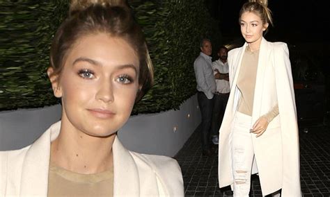 gigi hadid stuns in white and beige ensemble for dinner date daily mail online