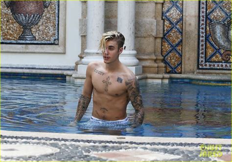 photo justin bieber goes shirtless for swim at versace mansion 12