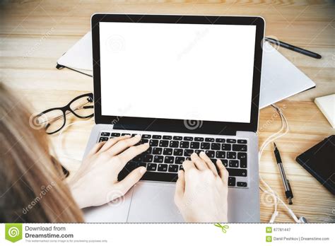 girl typing on laptop with blank screen glasses