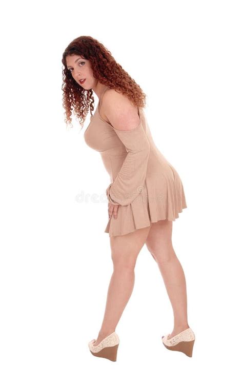 Woman Standing In Profile Bending Forwards Stock Image Image Of Adult