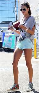 alessandra ambrosio shows off her tan toned legs in tiny shorts to pick