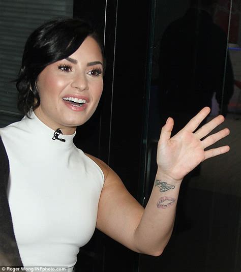 demi lovato covers up her vagina tattoo with freshly inked rose daily mail online