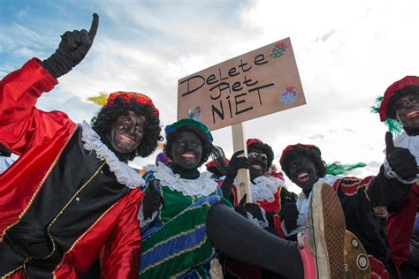 Santas Helpers In Blackface Ignite A Controversy In The Netherlands