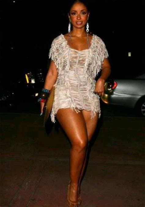 mya always showing off her gorgeous gams love this dress and her earrings curvalicious
