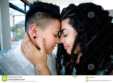Lesbian Couple Embracing Each Other And Smiling Stock Image Image Of