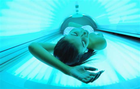 beautiful young woman tanning  solarium lucas products