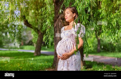 Pregnant Asian Beauty Woman In Summer Park Natural Pregnancy Girl