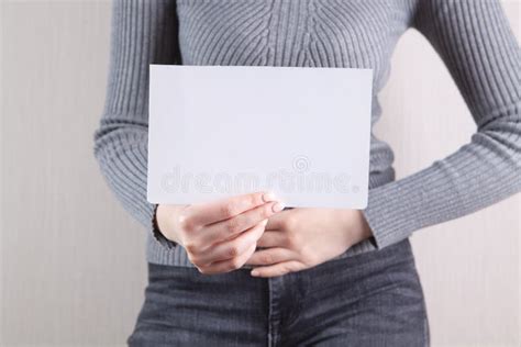 girl holding  blank sheet  paper   hands stock image image