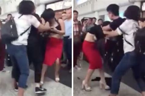 mistress stripped by lover s wife at airport before hot