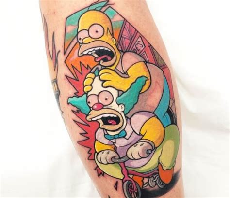 A Person With A Tattoo On Their Leg That Has The Simpsons Character