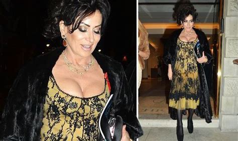 Nancy Dell Olio Flaunts Impressive Curves In Lace Dress