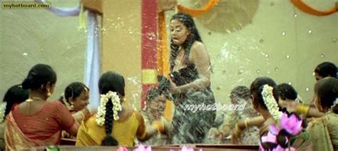 indian actress jyothika full boobs black nipples show wet dress slip