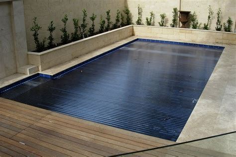 solar heated  ground fully automated pool cover gallery elite pool covers australia