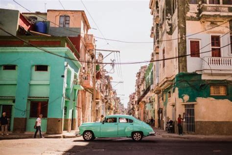 you can feel the sights and sounds of cuba in this sweet havana engagement junebug weddings