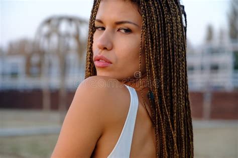 portrait of attractive asian model girl with braided hairstyle stock