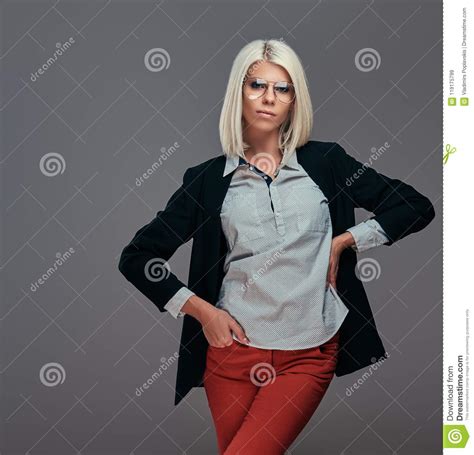 Fashion Blonde Woman In Trendy Clothes And Glasses Posing
